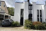Einzigartiges Architektenhaus - Markante Doppelhaushälfte mit schönem Garten