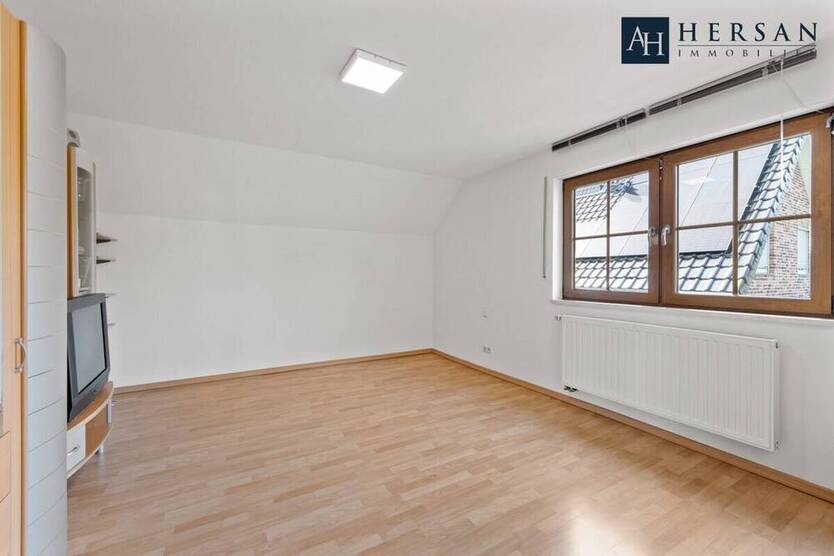 Einladende Eigentumswohnung im Einfamilienhausstil mit Garten in Baesweiler!
