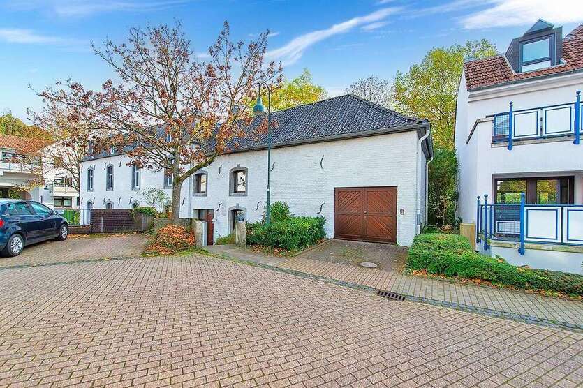 PHI AACHEN - Raumwunder mit großzügigem Süd-Garten und Garage im Herzen von Laurensberg!
