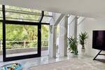 Einzigartiges Architektenhaus - Markante Doppelhaushälfte mit schönem Garten