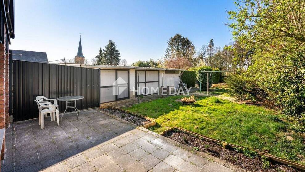 Raum für die ganze Familie - Charmantes Zweifamilienhaus mit Gartenidylle