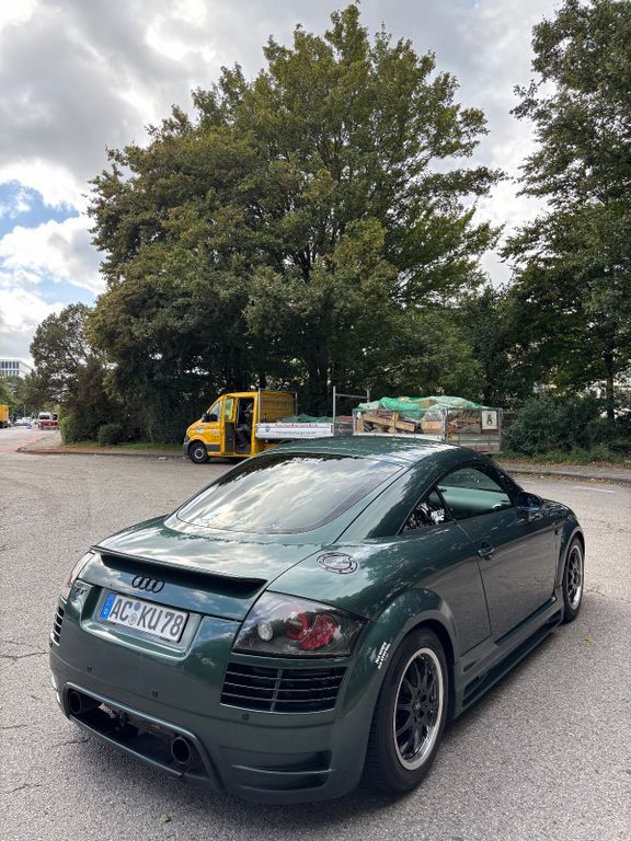 TT