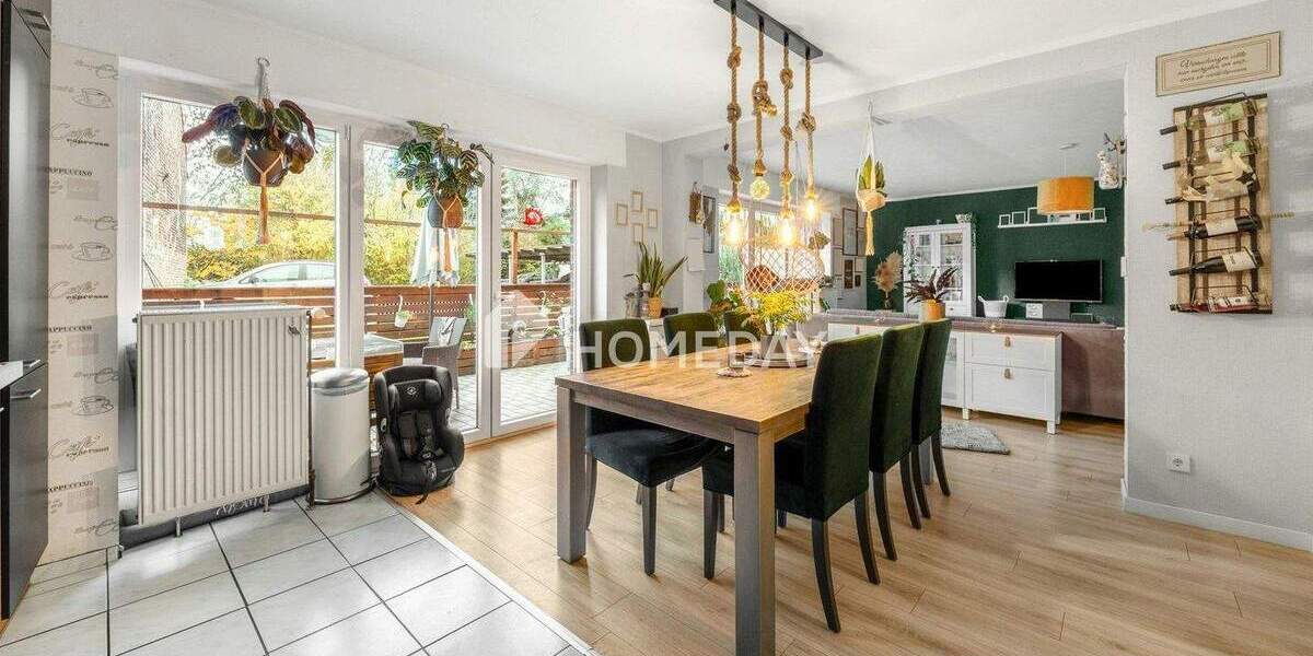 Lichtdurchflutetes EG mit offener Küche, überdachter Terrasse und klarer Raumaufteilung 3 zimmer