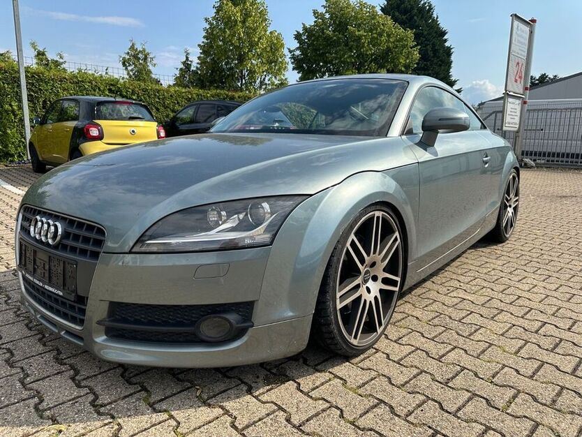 TT