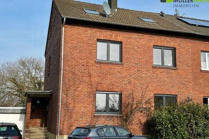 Gepflegte Erdgeschoss-Mietwohnung mit Garten und Garage in Düren-Echtz