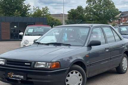 Mazda 323 64.963 km 1.999 &euro; Düren 52349