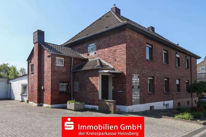 Haus zum Kaufen in Übach-Palenberg 195.000 € 154.37 m²