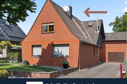 Einladende Eigentumswohnung im Einfamilienhausstil mit Garten in Baesweiler!