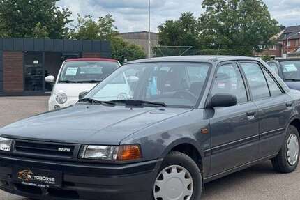 Mazda 323 64.963 km 1.999 &euro; Düren 52349