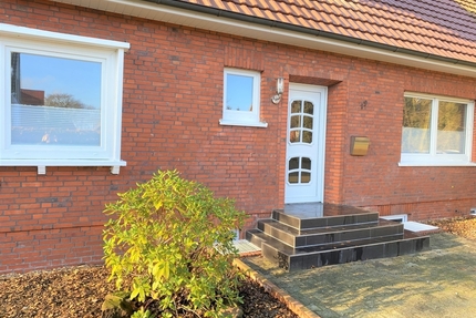 Erdgeschoßwohnung mit Kamin, Terrasse und Garten!