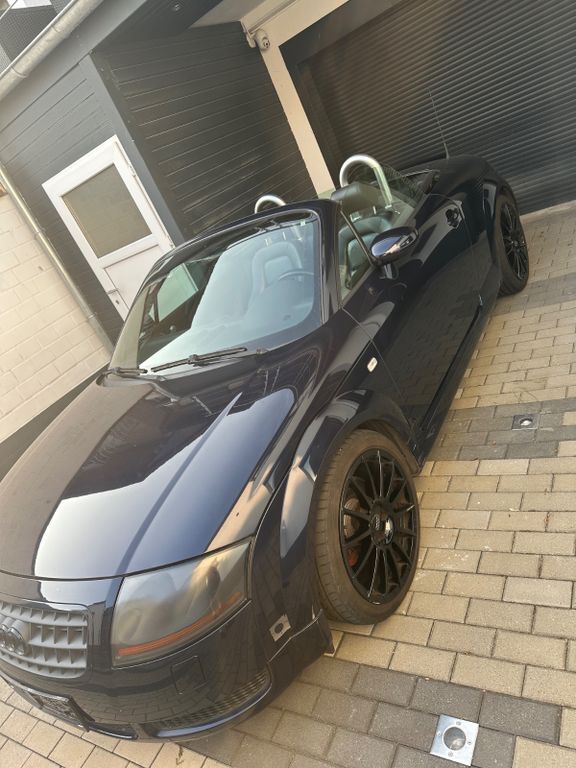 TT
