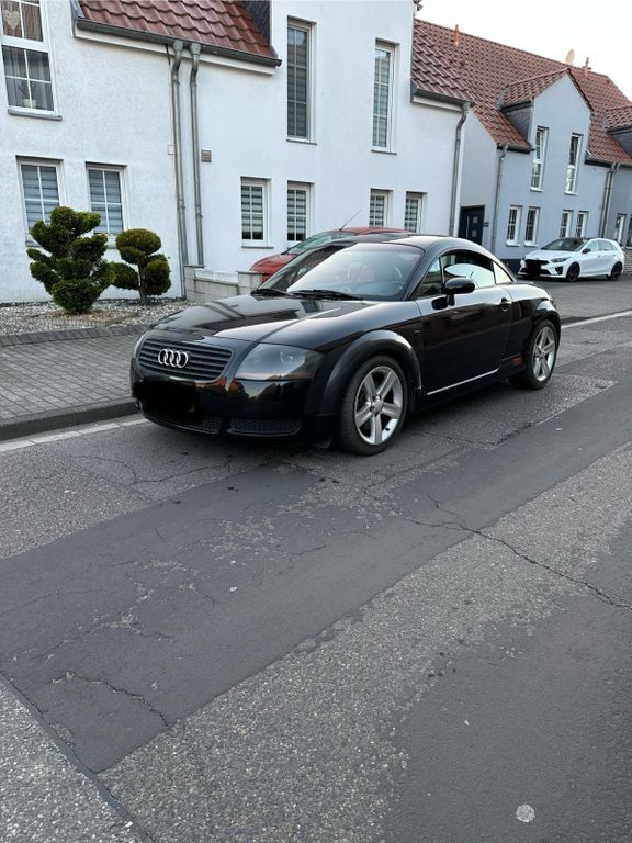 TT